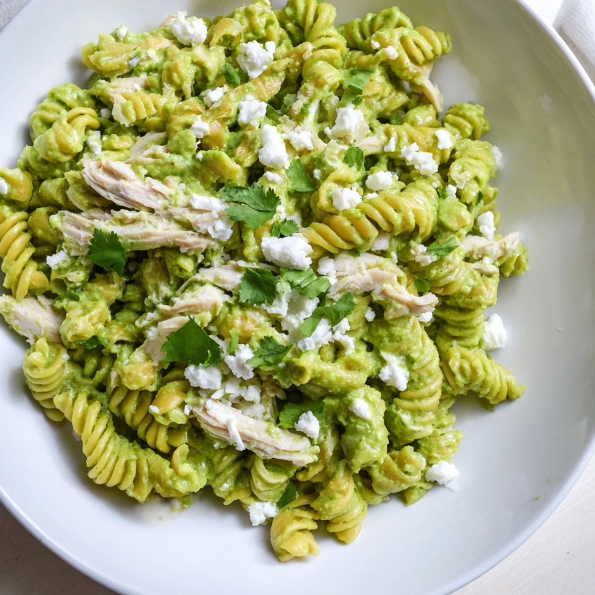 Fresh rotini pasta and shredded chicken tossed in a vibrant, creamy cilantro lime sauce.  